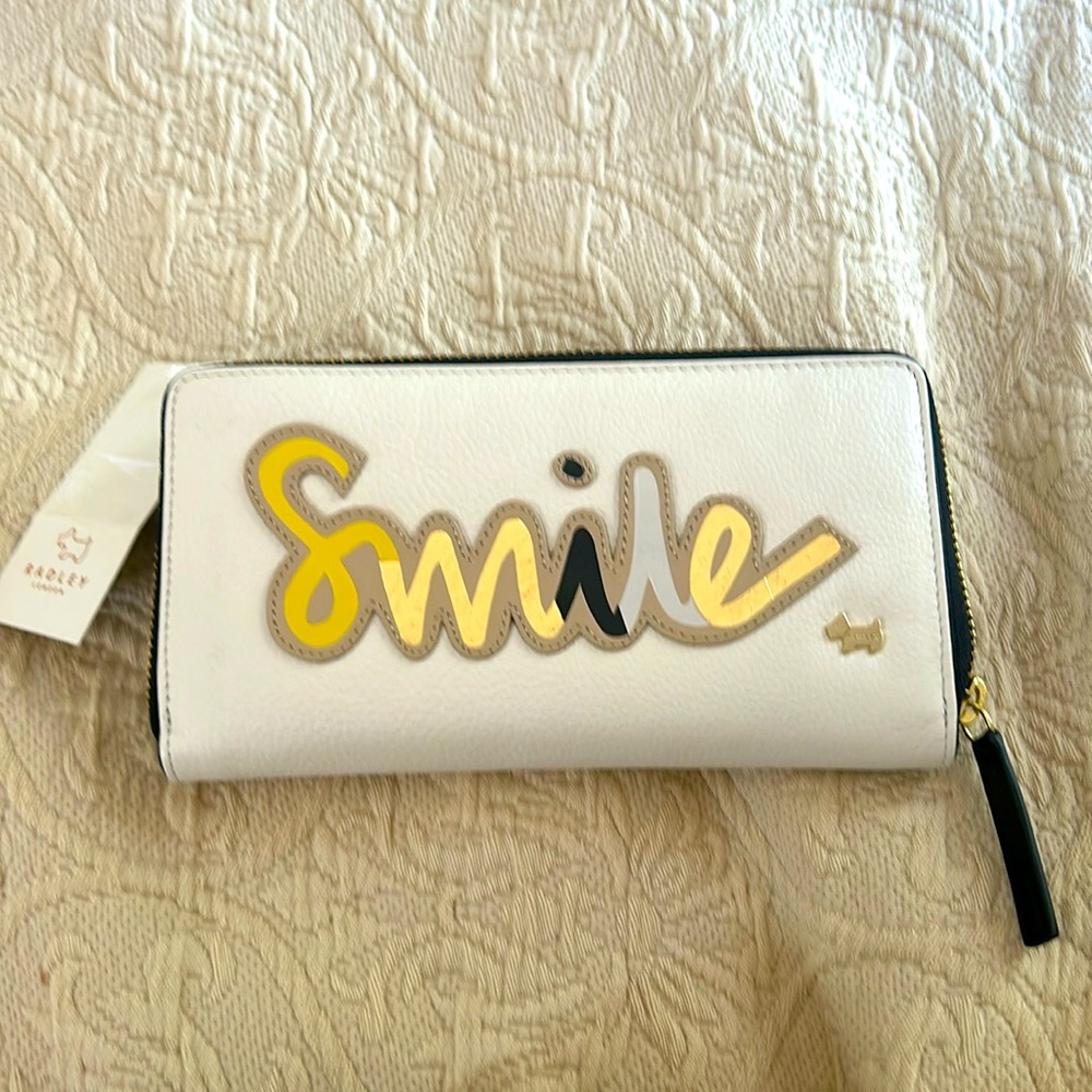 Radley wallet SMILE logo new ,never used no markings or scrapes